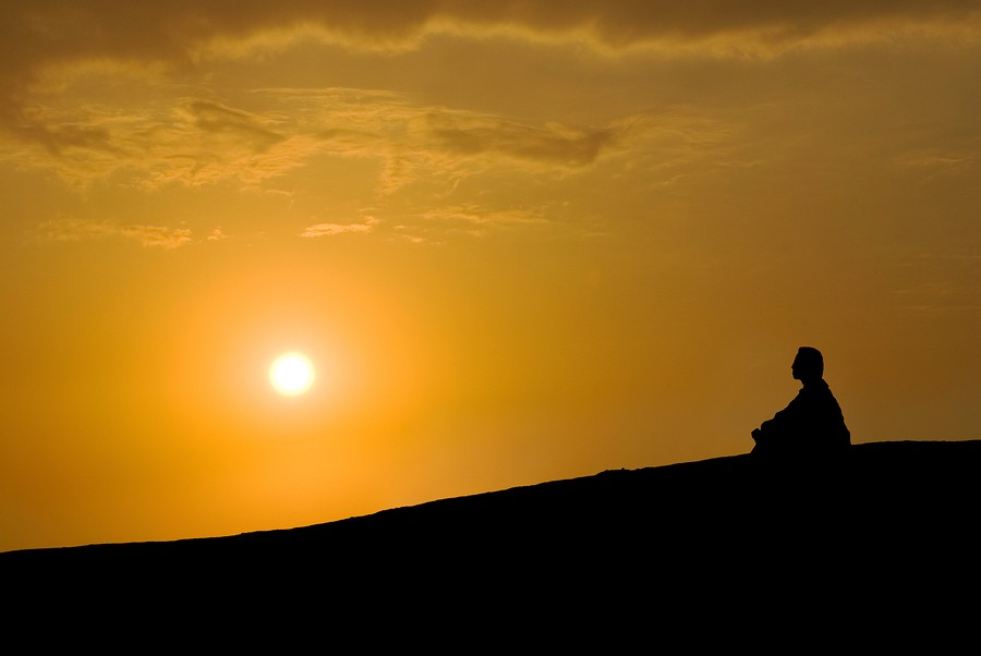 meditation under sunset